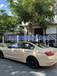 Cần bán xe BMW 3 Series 320i màu Vàng 2012